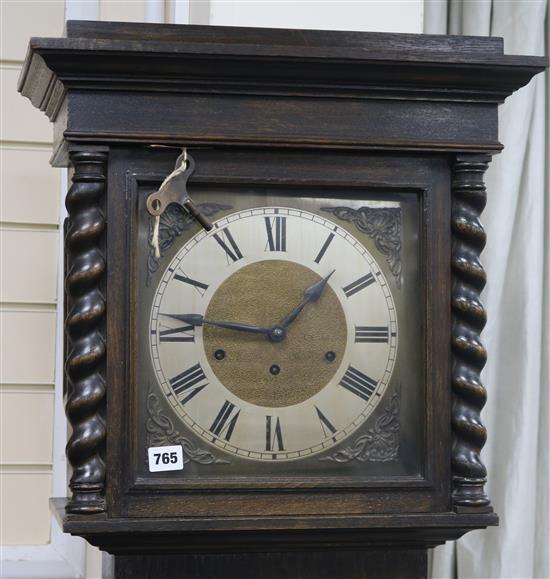 A 1920s oak chiming longcase clock H.189cm